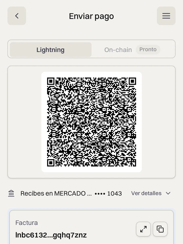 Aureo payment screen with a Lightning QR code, invoice, Bitcoin amount, and pesos to receive